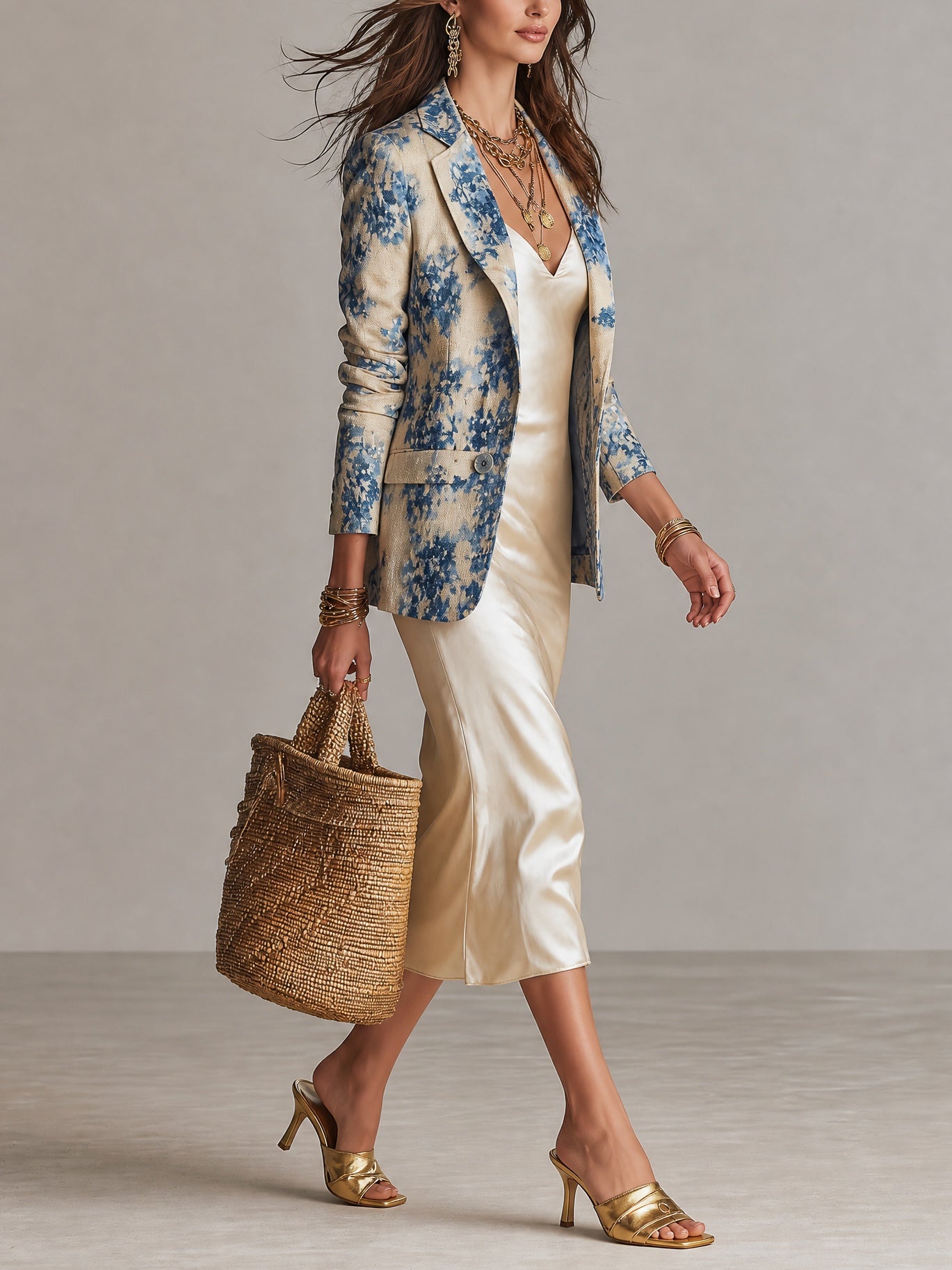 Elegant Layered Dress Set Featuring A Blue Floral-print Blazer And A Beige Satin Dress